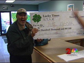 Alec Ahsoak collected his $500,000 winnings Saturday at Lucky Times Pull Tabs.